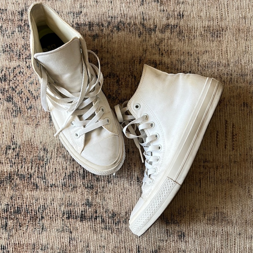 All white converse high tops with Lunarlon padded insoles. Women’s size 9.5